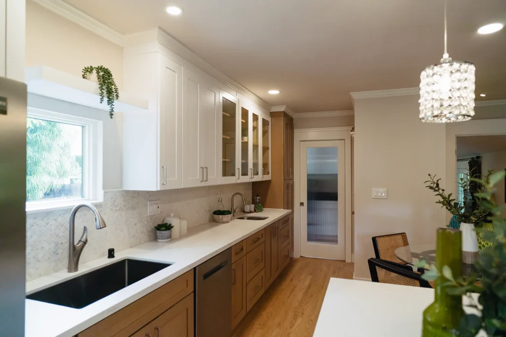 Complete kitchen remodel featuring ceiling fan and chandelier installation in Sacramento, CA by Tenax Construction