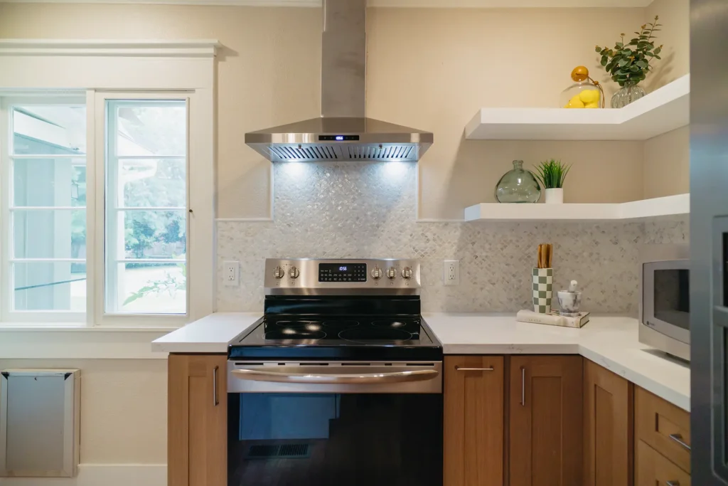 Complete kitchen remodel featuring prefabricated countertops with eased edge profile in Sacramento, CA by Tenax Construction